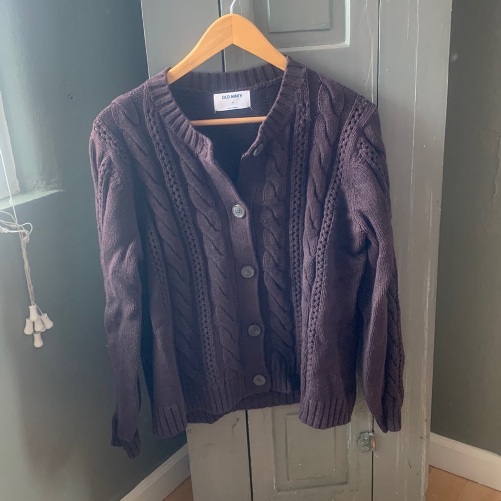 Chocolate brown button down sweater with cable knit accents and tortoise buttons